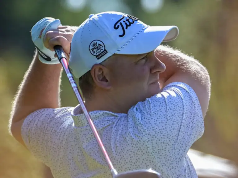 A member finishes his swing on the Elgin course